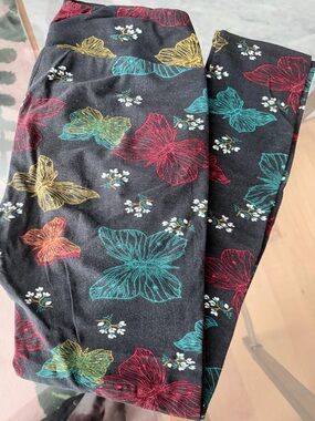 LuLaRoe Black Leggings with Teal, Red and Yellow Butterfly Print